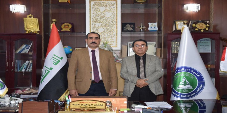تهنئة السيد العميد للسيد معاون العميد للشؤون العلمية  